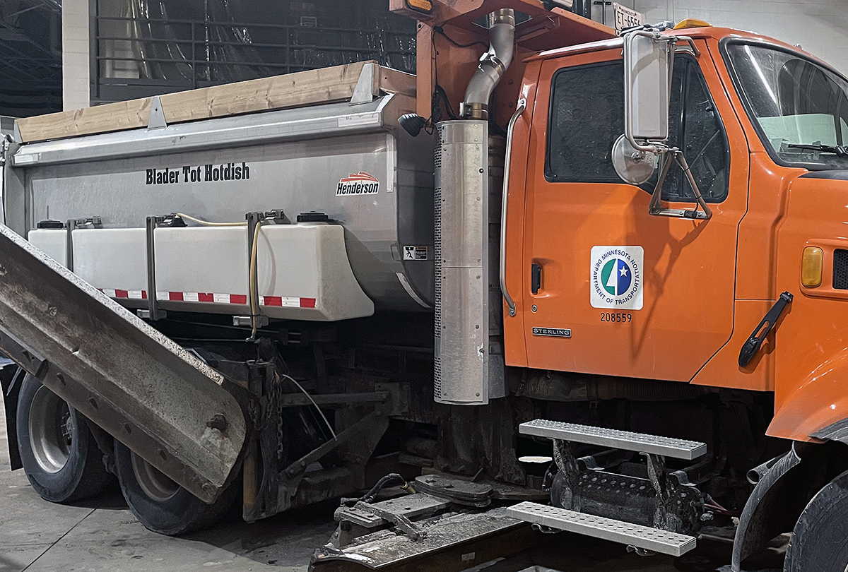 Photo: MnDOT plow with "blader tot hot dish" written on its side